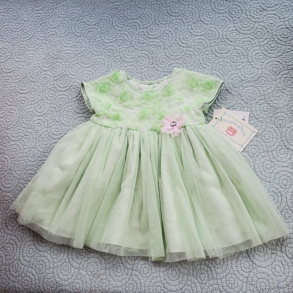 Marmellta fancy green dress. size 6-9 months